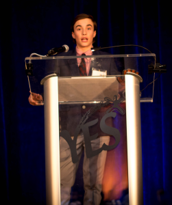 Photo 1 YES youth and Brookline native Jordan Levitch speaking  at the YES Black Diamond Gala on April 2nd.